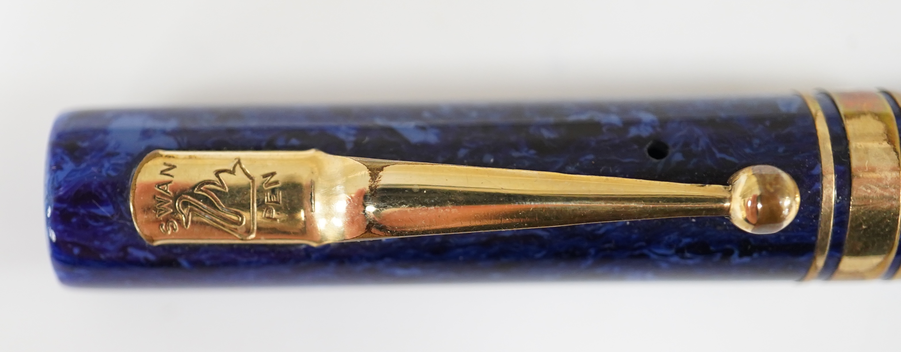 A Swan Mabie Todd & Co. lapis blue lever filler with gold filled trim